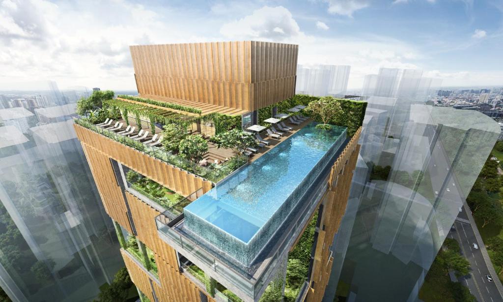 新加坡Artyzen Singapore的一座带游泳池的建筑的 ⁇ 染