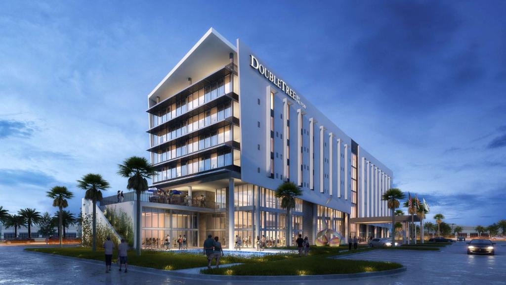 迈阿密DoubleTree by Hilton Miami Doral的把酒店与外面的人 ⁇ 成一团