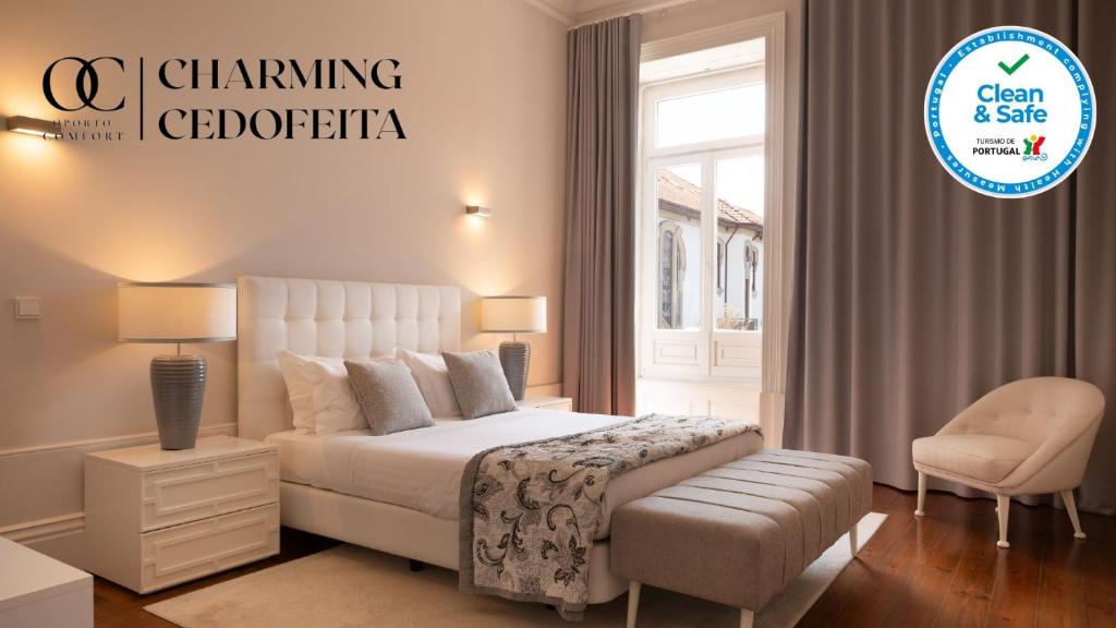 波尔图Oporto Comfort Charming Cedofeita的卧室配有床、椅子和窗户。