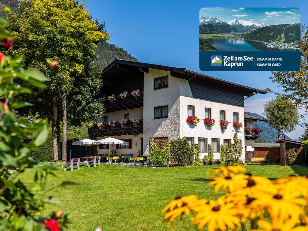 滨湖采尔Gästehaus Bleiweis-Zehentner的酒店享有湖泊和山脉的景致。