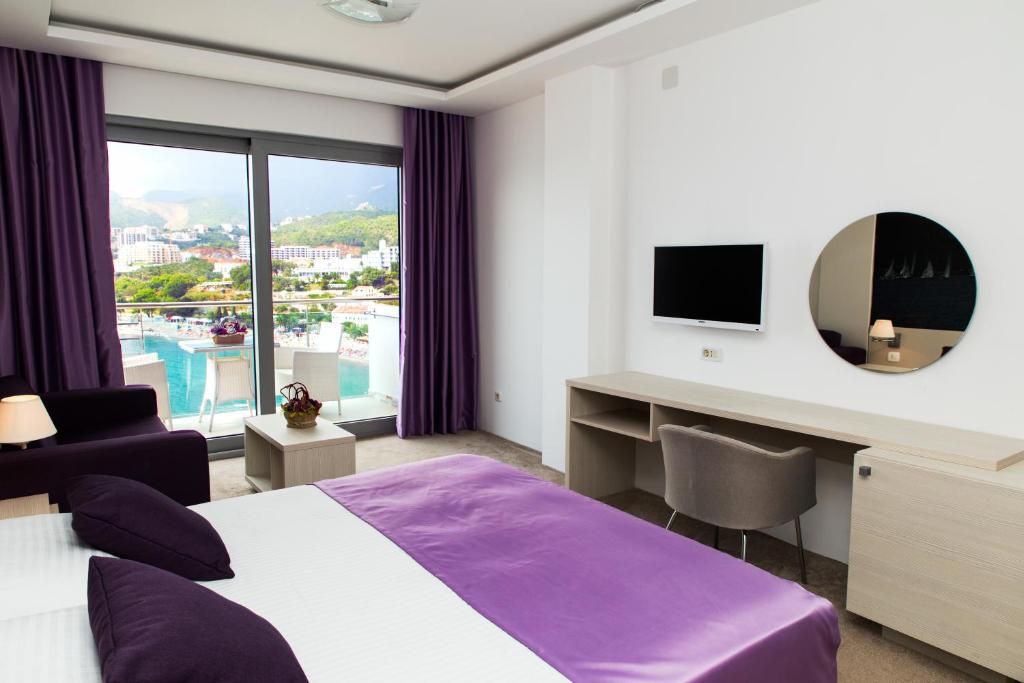 Hotel Ponta Nova客房内的一张或多张床位