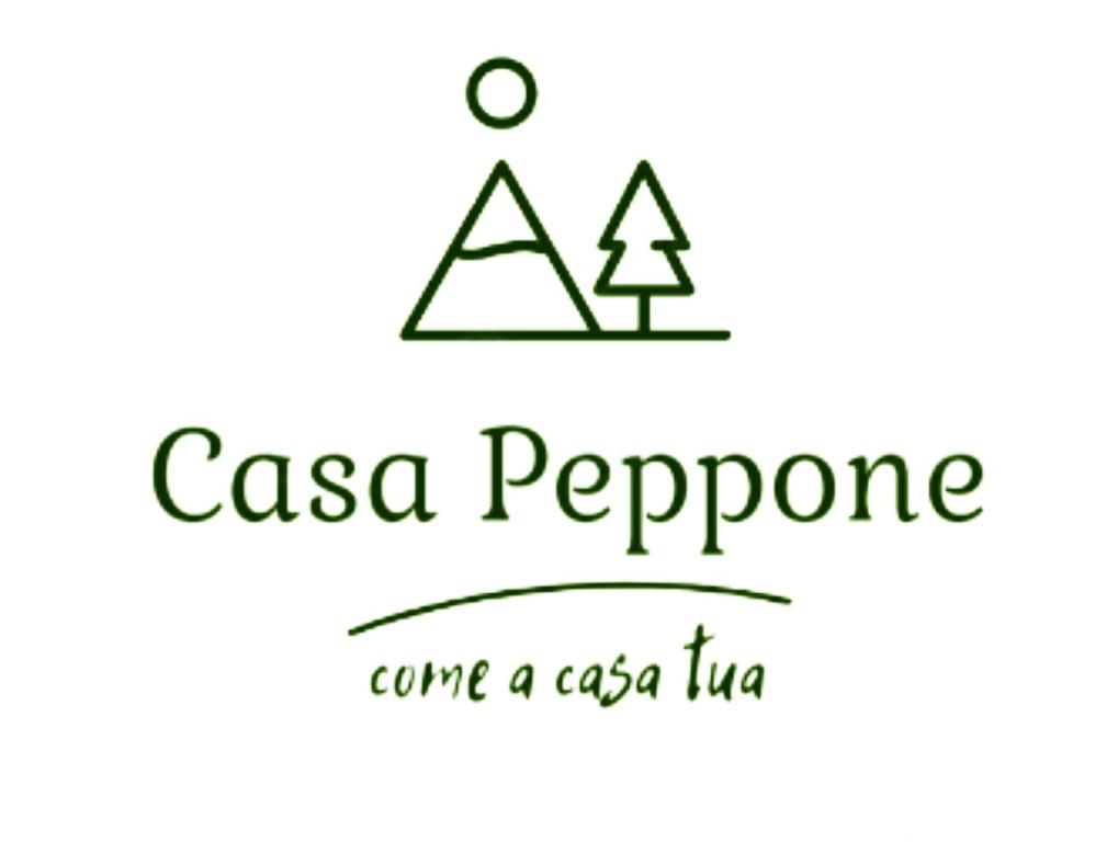 佩斯卡塞罗利Casa Peppone的树和 ⁇ 树来到一个caica inc标志