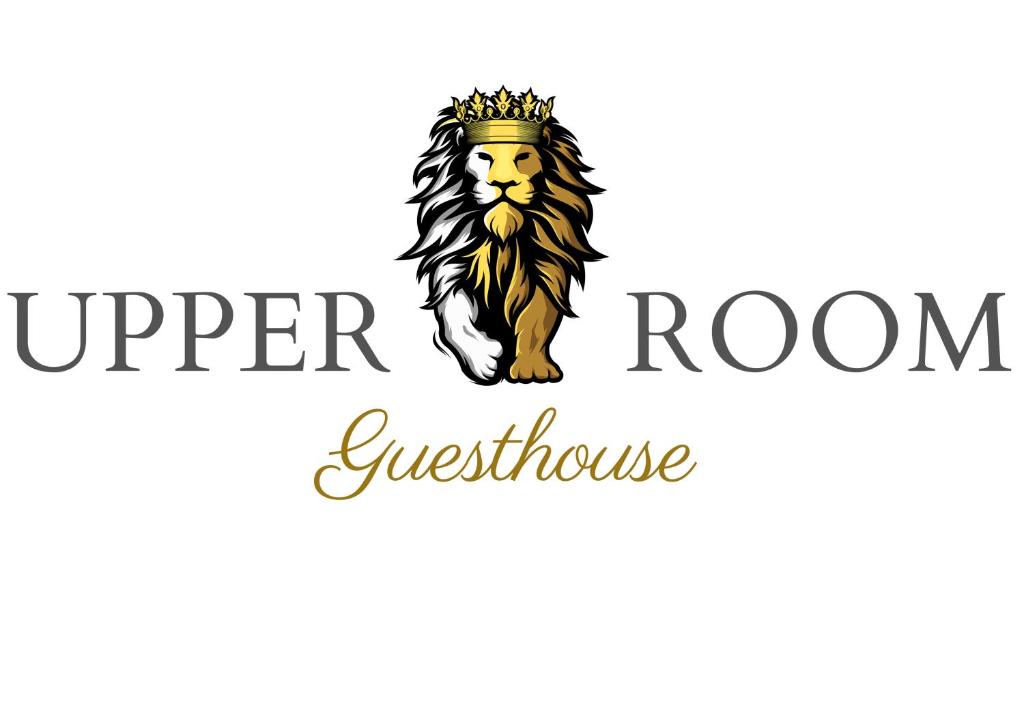 KirkwoodUpper Room Guesthouse的一只头上冠的狮子,上面写着一个字