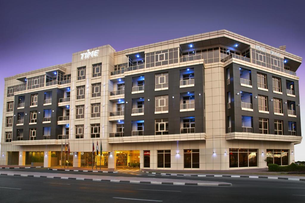 迪拜TIME Grand Plaza Hotel, Dubai Airport的建筑的 ⁇ 染
