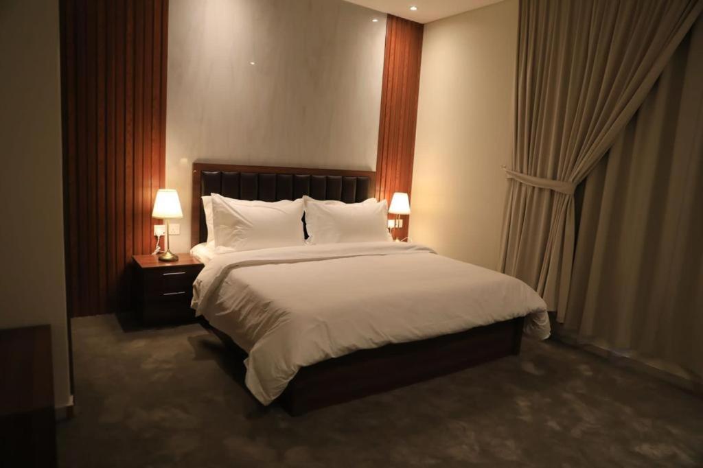 بريفير للأجنحة الفندقية Privere Hotel Suites客房内的一张或多张床位