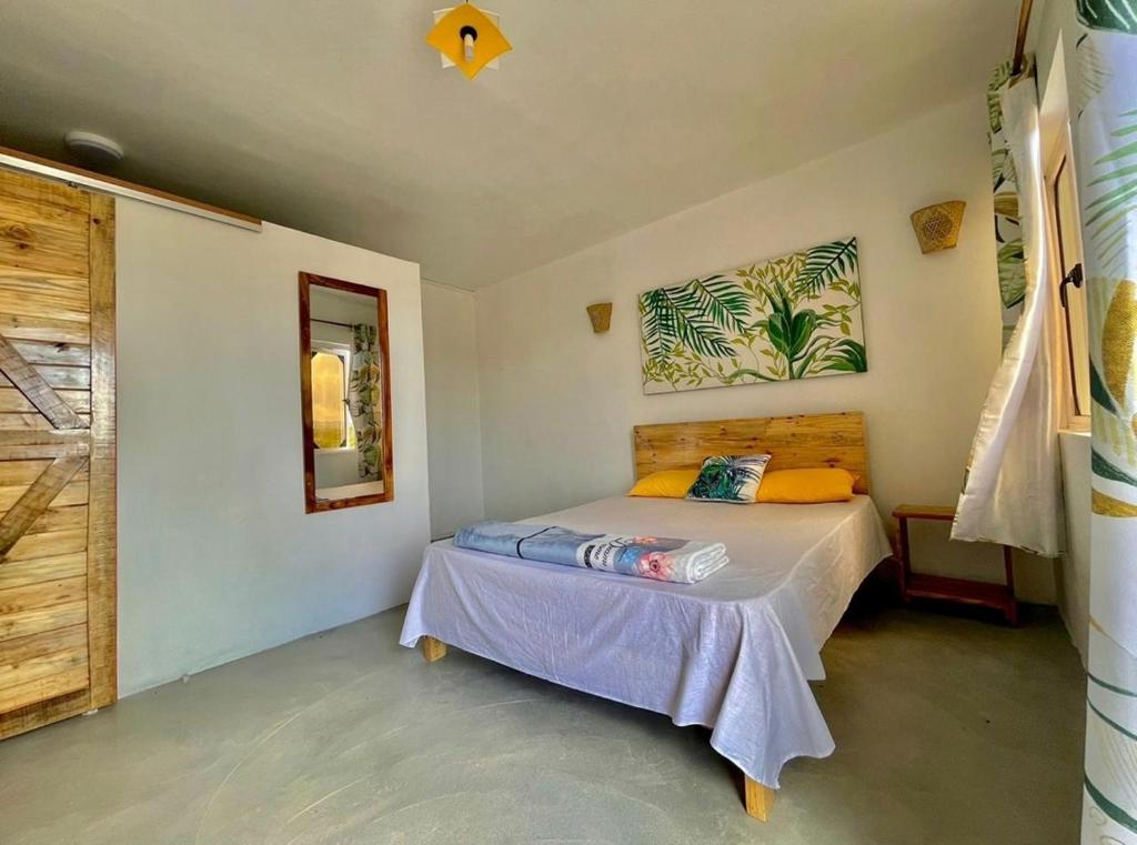 Rodrigues IslandPanoramic Paradise的卧室配有一张床