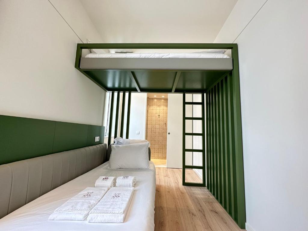 A'MAR by Alojamento Ideal客房内的一张或多张床位