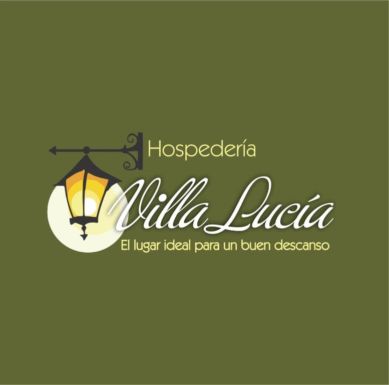 莱瓦镇Hospedería Villa Lucía的灯灯和牛奶的旅馆标志