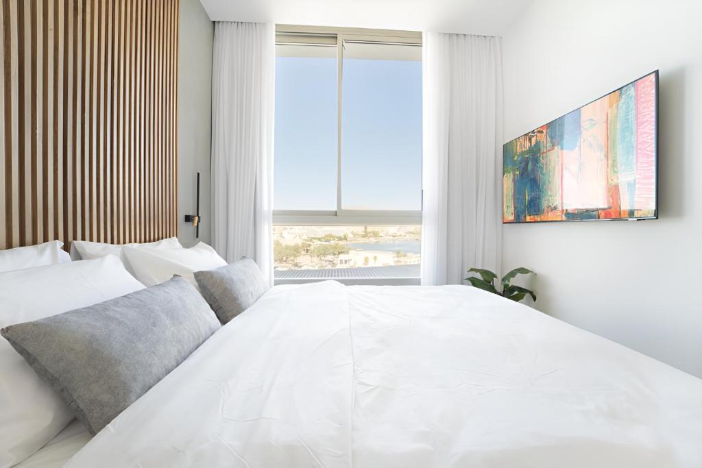Nathan&#39;s Suites On The Beach客房内的一张或多张床位
