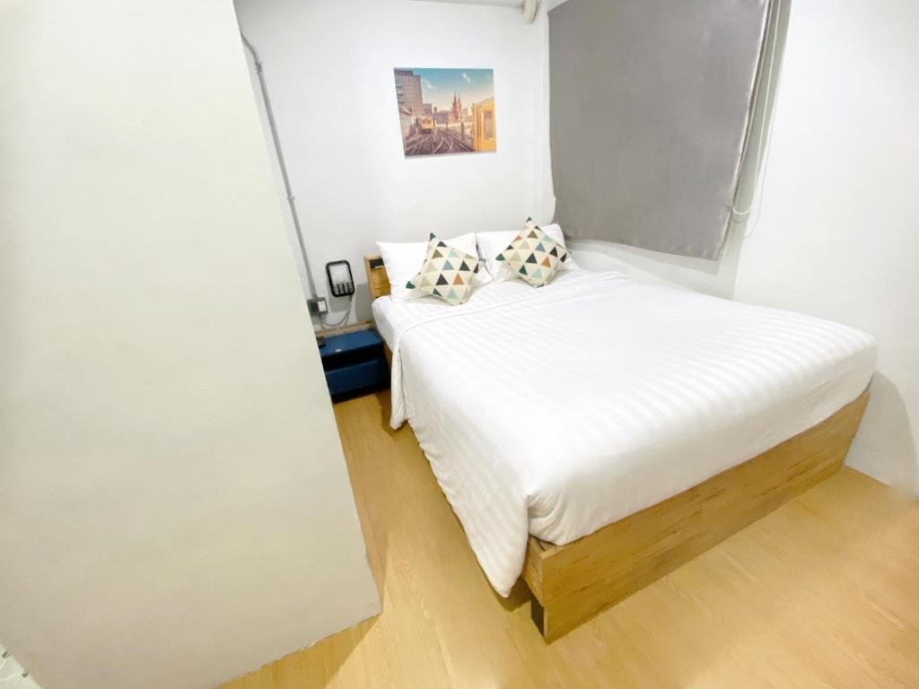 ซับรูมโฮเทล Subroom Hotel客房内的一张或多张床位