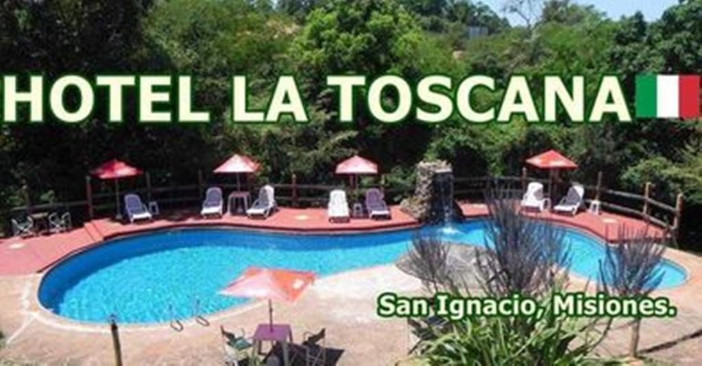 圣伊格纳西奥HOTEL LA TOSCANA的读拉托斯卡纳酒店的一个标志