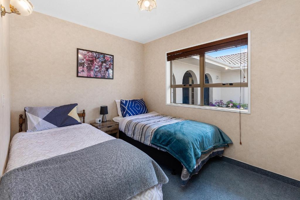 Hamilton Summer Treat- 4 Bedroom with pool客房内的一张或多张床位