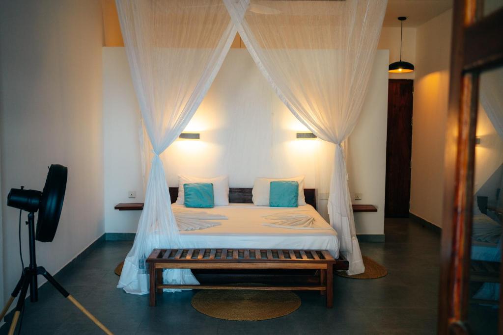 撒维拉海滩别墅客房内的一张或多张床位