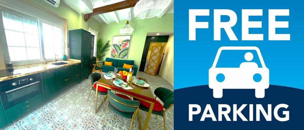 瓦伦西亚Esmeralda Apartment With Free Private Underground Parking的一个带桌子的厨房和一个带汽车的厨房