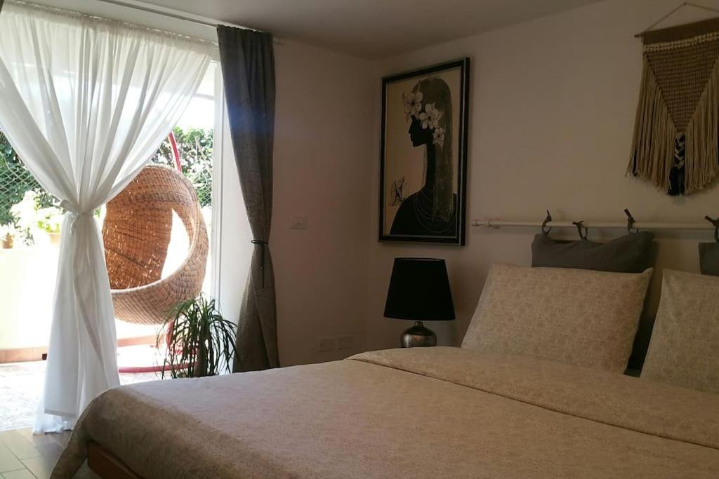 Cristina’s flat Riccione客房内的一张或多张床位