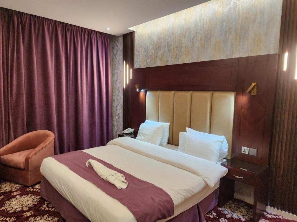 EWG Al Hamra Hotel客房内的一张或多张床位