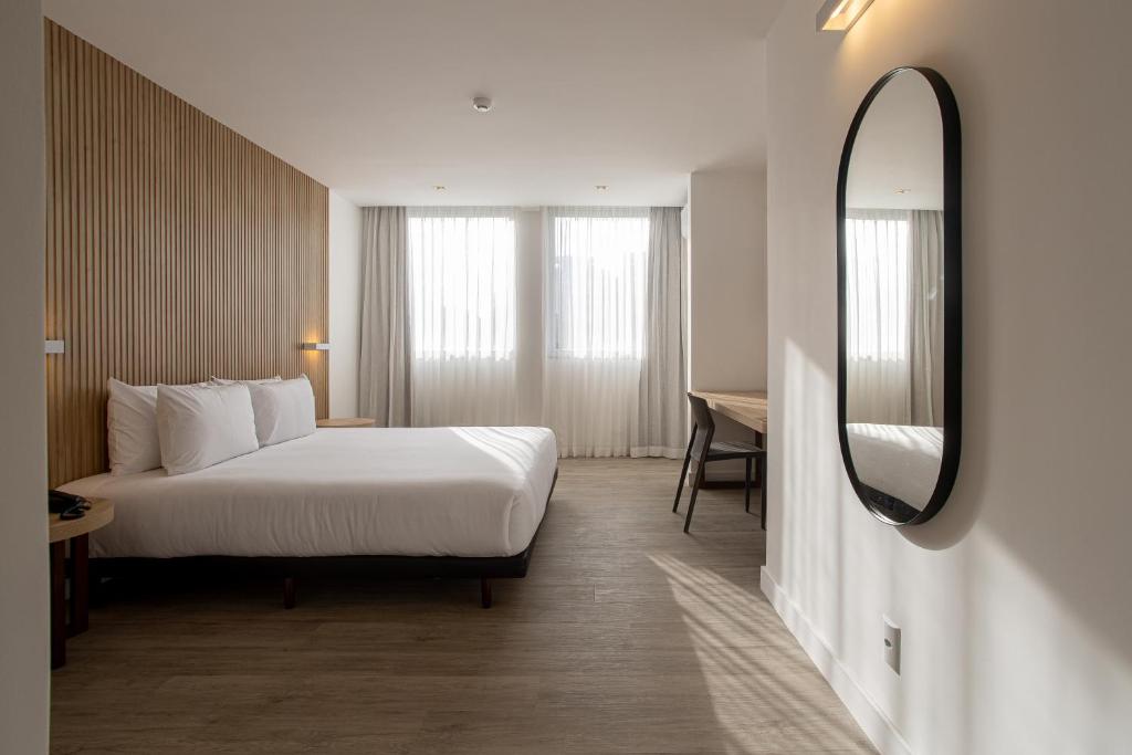 Sooz Hotel Collection客房内的一张或多张床位