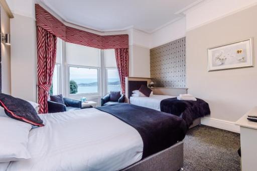 Lauriston &amp; Lawton Court Hotel客房内的一张或多张床位