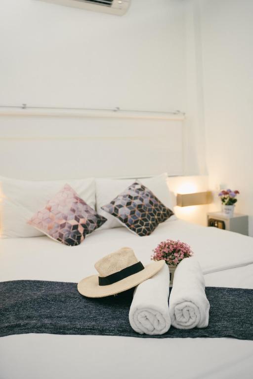 Qilombo Hostel Silom - HQ客房内的一张或多张床位