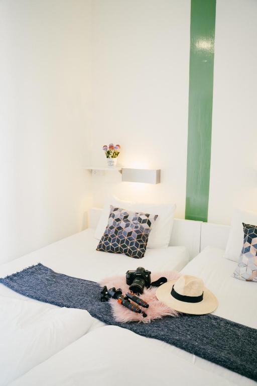 Qilombo Hostel Silom - HQ客房内的一张或多张床位