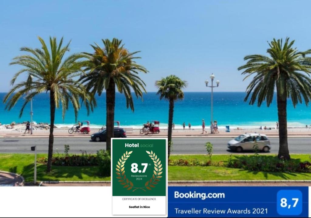 尼斯Seaflat in Nice的棕榈树和海滩酒店标志