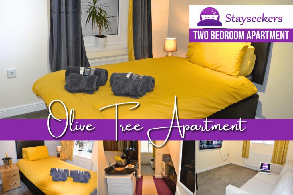 索尔兹伯里Olive Tree 2 bed Apartment - STAYSEEKERS的一间卧室配有黄色的床,上面有2袋