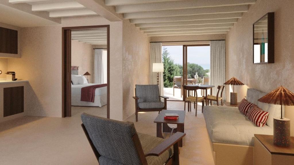 Es ArenalsDunas de Formentera的带沙发的客厅和带卧室的房间