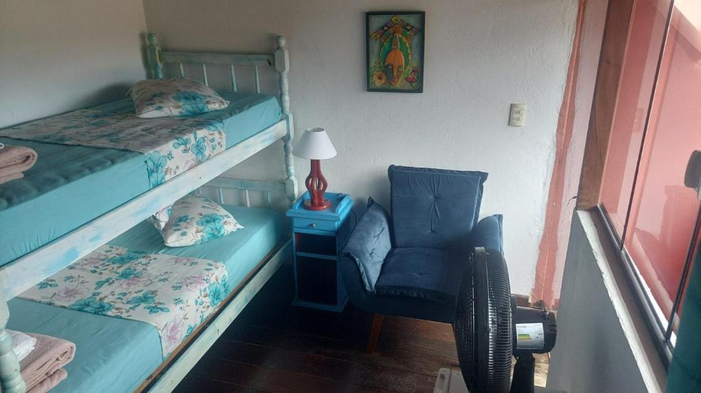 Pousada Casa do Rio Hostel - 8 min do Centro Hístorico - Passeio de Barco com saída da Pousada -Pago a parte- Perto das Praias e Beira Rio客房内的一张或多张床位