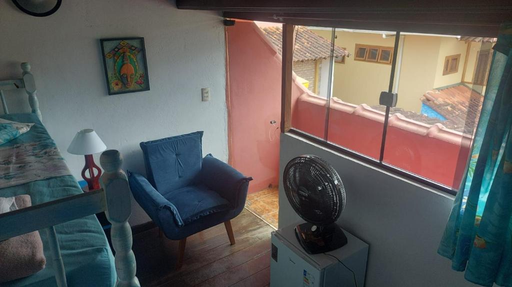 Pousada Casa do Rio Hostel - 8 min do Centro Hístorico - Passeio de Barco com saída da Pousada -Pago a parte- Perto das Praias e Beira Rio的休息区