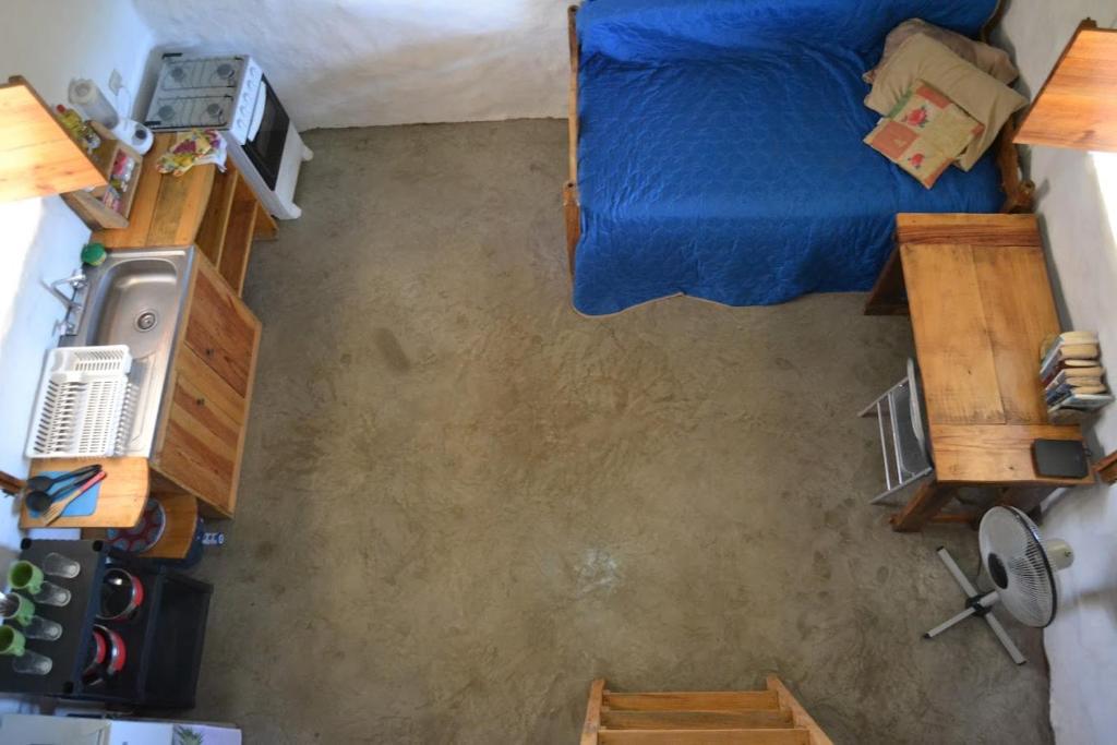 波波约Castaways Nicaragua的卧室享有上方的景致,配有1张床
