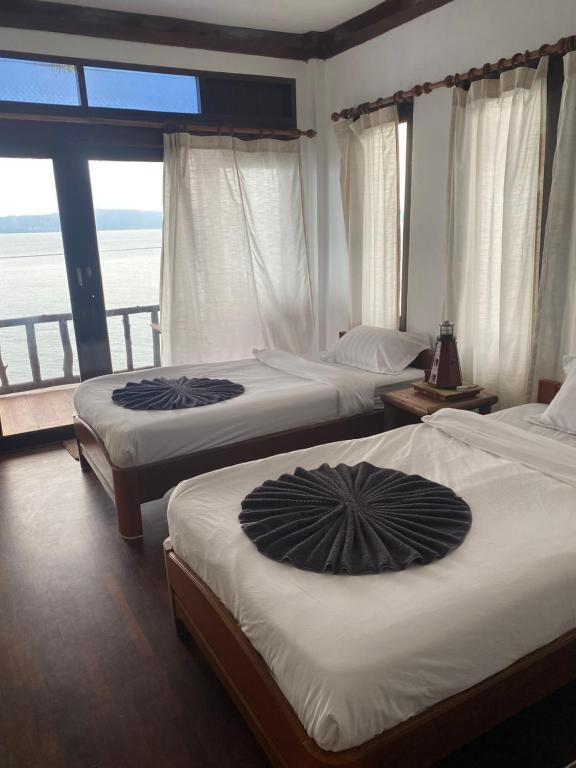 哈林海滩灯塔简易别墅的海景客房 - 带两张床