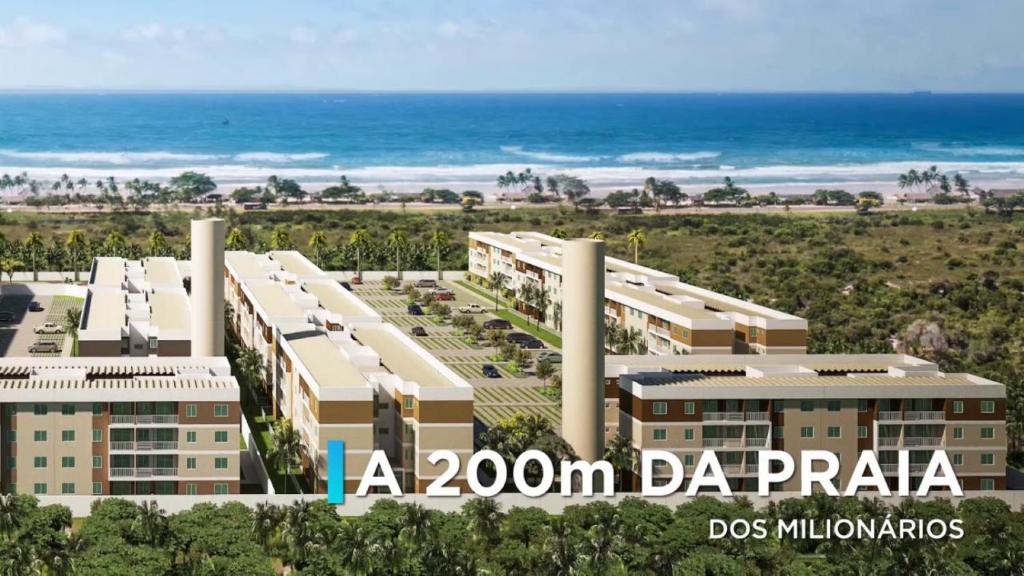 伊列乌斯APARTAMENTO EM ILHÉUS - PRAIA DOS MILIONÁRIOS - VOG ATLÂNTICO - Pé na Areia的一卧室公寓的客房享有海滩美景。