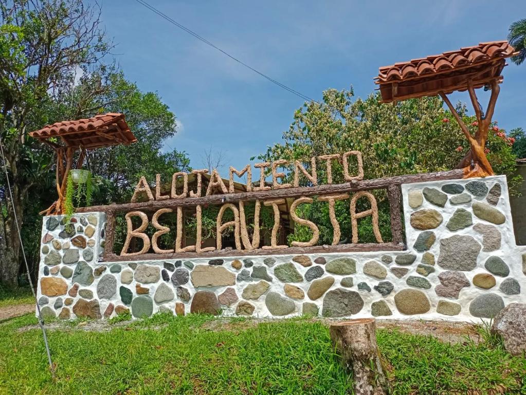 莫科阿Alojamiento rural Bellavista Experiences的aahu国际巴林标志