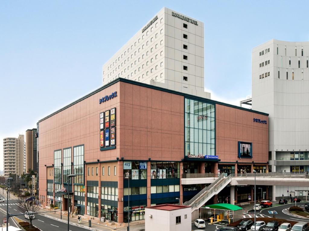 水户茨城水户大和ROYNET酒店(Daiwa Roynet Hotel Ibaraki Mito)的城市建筑物的 ⁇ 染