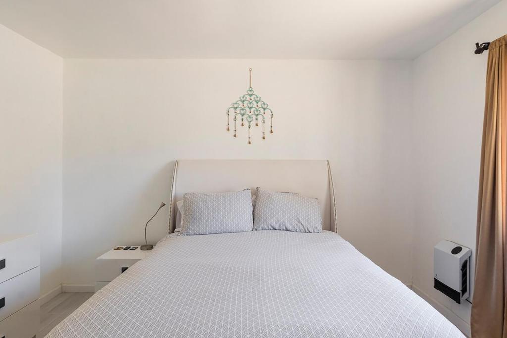 Electroliquid&#39;s Casa Pueblo Joshua Tree客房内的一张或多张床位