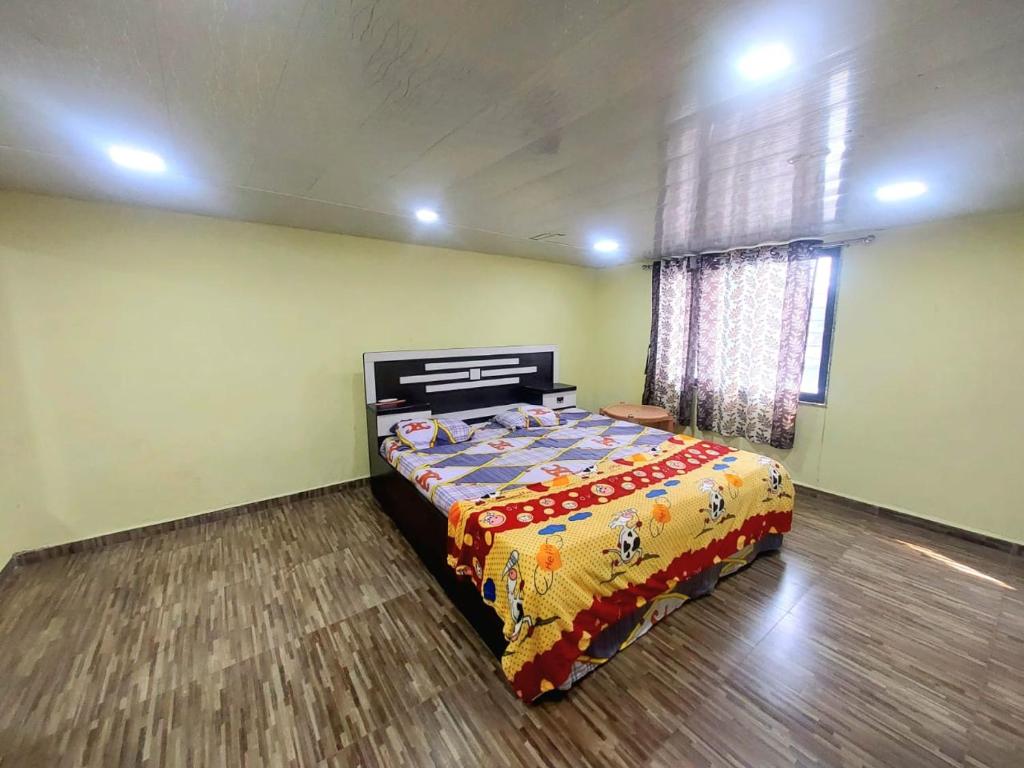 Namaste Nirvana Shanti Villa客房内的一张或多张床位