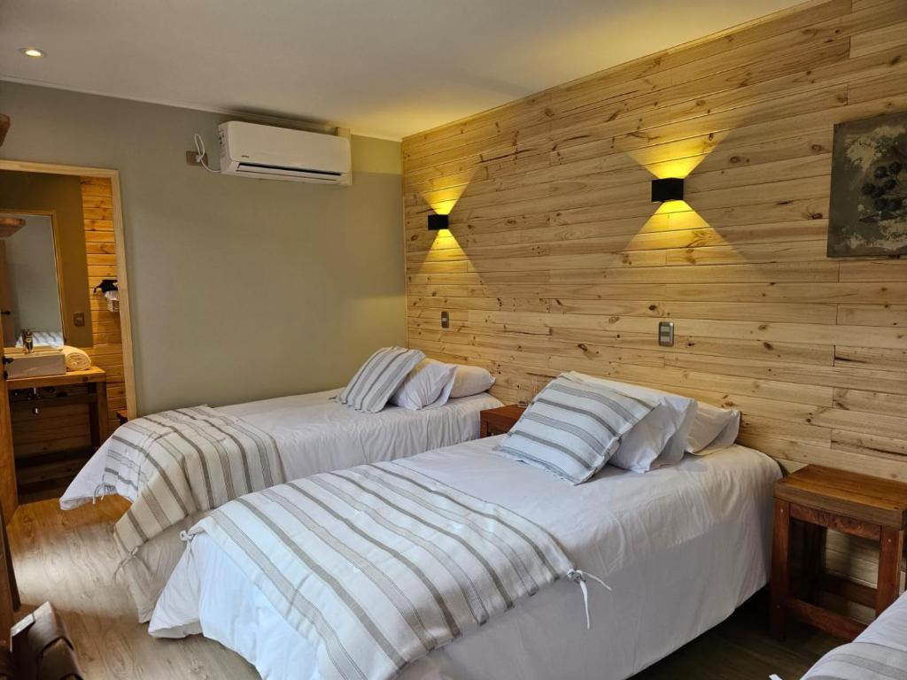 Hotel Bacaris客房内的一张或多张床位