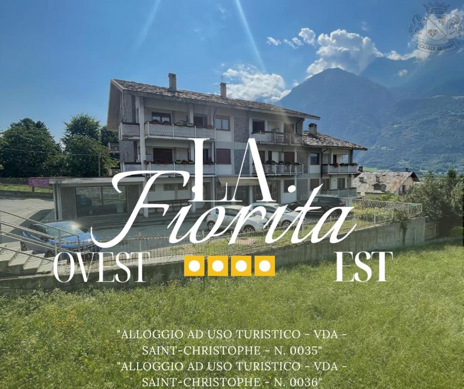 奥斯塔La Fiorita Aosta的房屋前别墅的海报