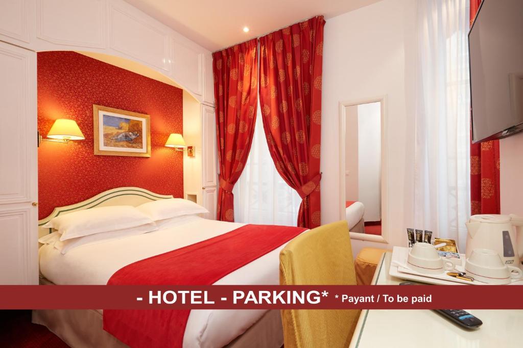 巴黎奥斯丁圣拉扎尔酒店的酒店客房设有床和窗户。