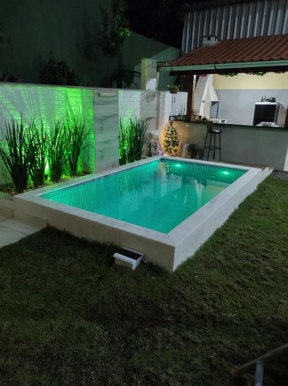 布希奥斯Espaço Zoey的后院的游泳池