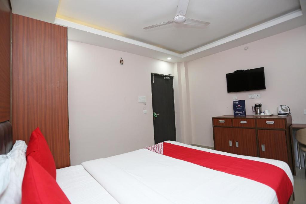 Kamat Inn客房内的一张或多张床位