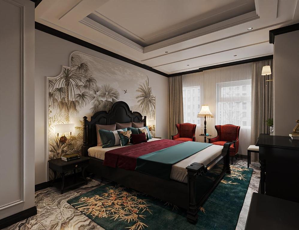 胡志明市Nicecy Saigon Hotel的一间卧室配有一张特大号床。