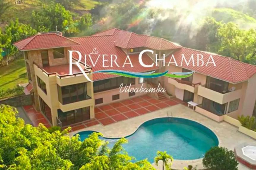 洛哈La Rivera Chamba Apartamento的 ⁇ 染河岸别墅