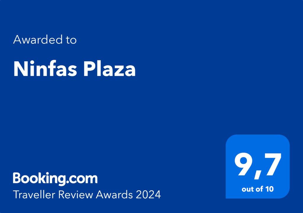玛德琳港Ninfas Plaza的蓝色的屏幕,上面有文字想要的黑利塔斯广场