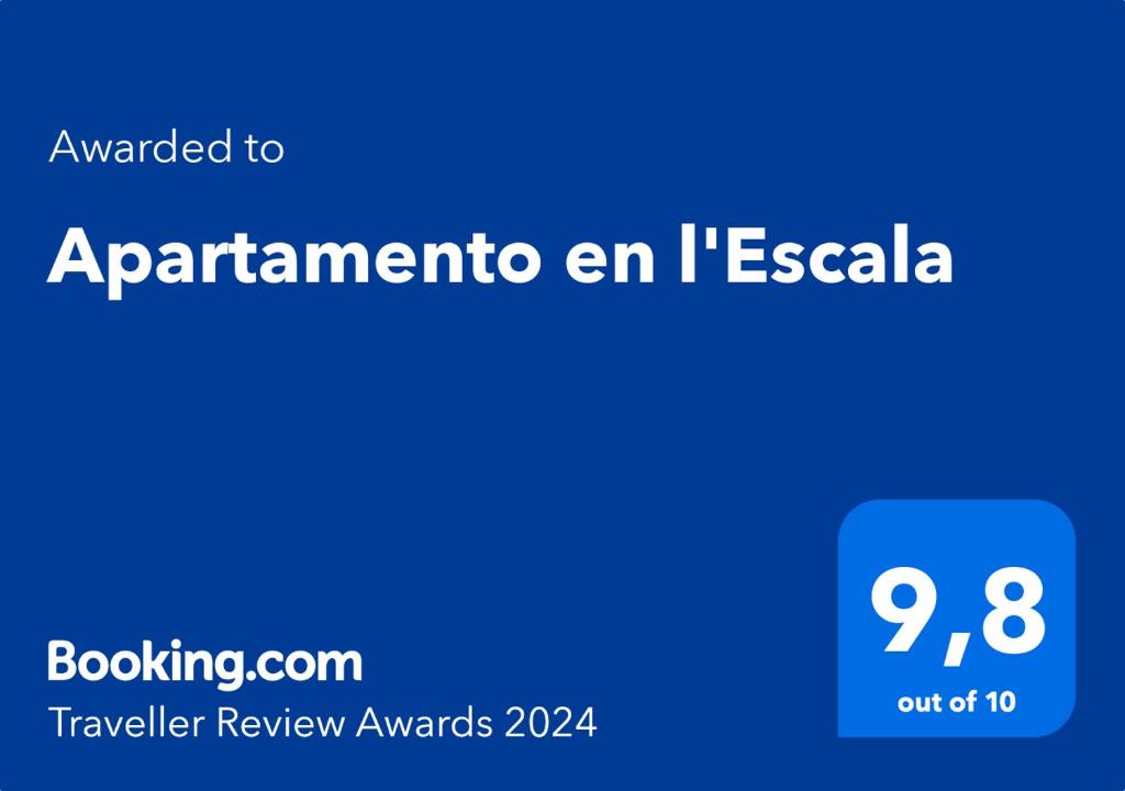 莱斯卡拉Apartamento en l'Escala的带有单词armaento的蓝色标志 页:1 冰 ⁇ 