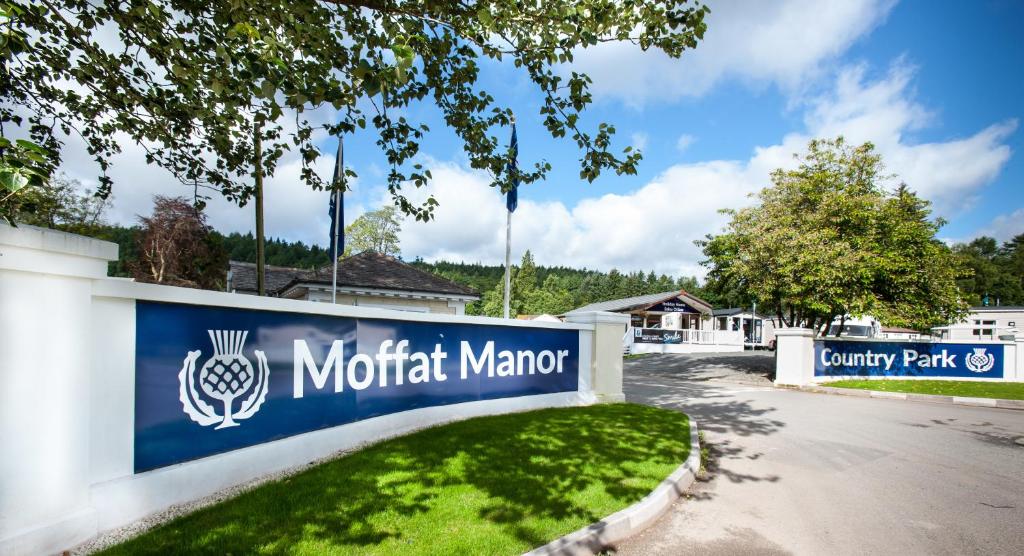 比特克 Moffat Manor Holiday Park的 ⁇ 马达的斗士的标志