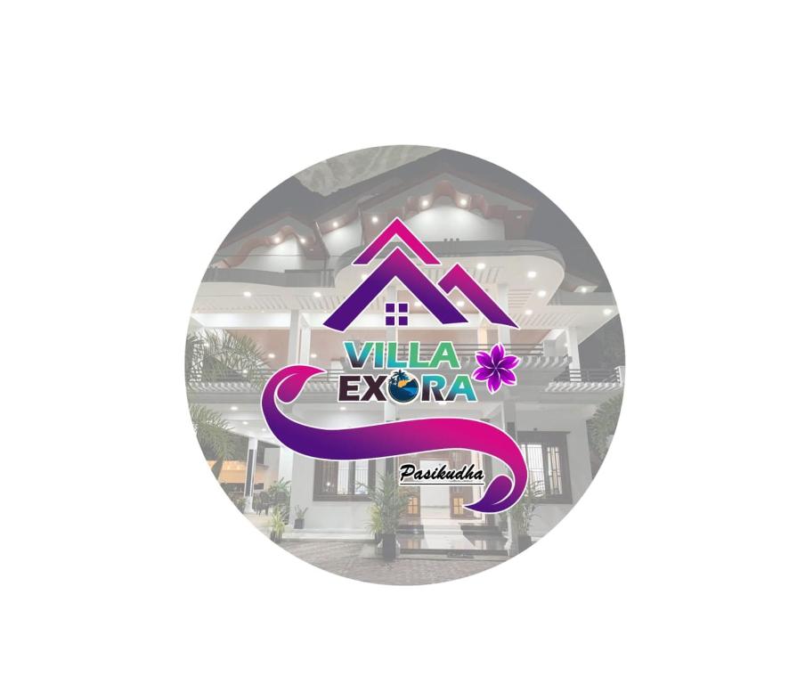 拜蒂克洛Villa Exora Pasikudha的别墅标志