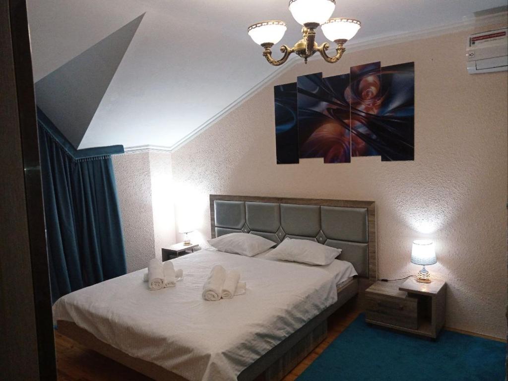 Next hotel Tashkent客房内的一张或多张床位