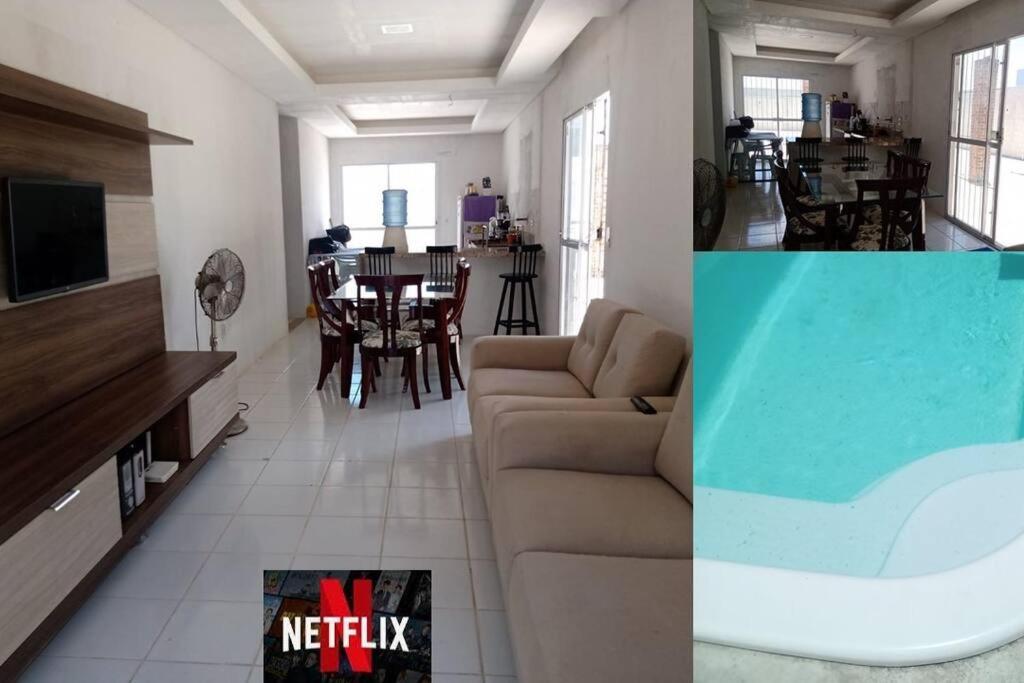 伊塔马拉卡Casa com piscina Forte Orange- Itamaracá的带沙发的客厅和用餐室