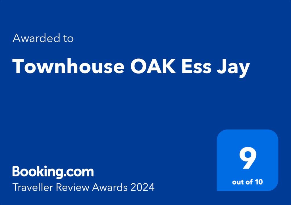 班加罗尔Townhouse OAK Ess Jay的全镇橡木日网页的屏幕